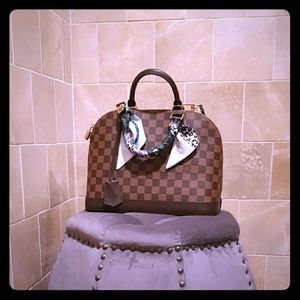 Damier ebene alma pm
